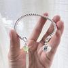 Ding Dang Bracelet: Personalized Double Palace Bell with Twisted Wire