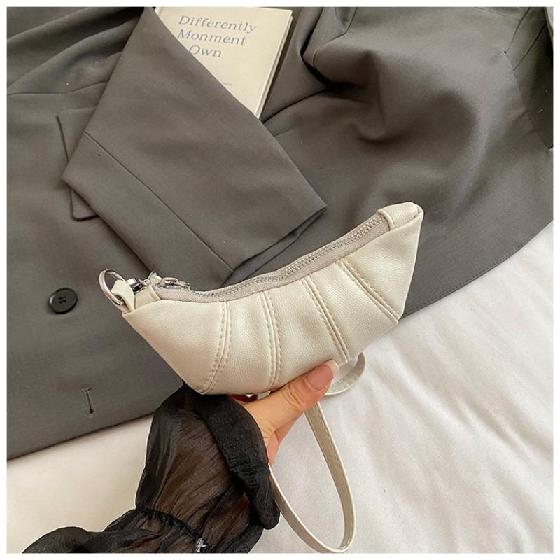 

Простая и легкая, новая летняя сумка-круассан имеет популярную и красивую форму, и это повседневная портативная наплечная сумка через шею. белый