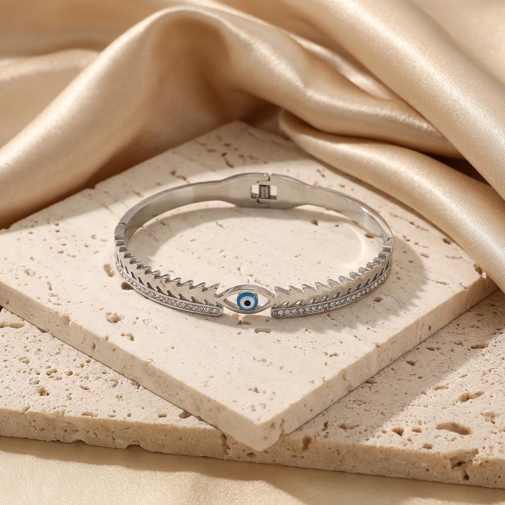 Dämonenauge Titanstahl Strassstein Armband - Modisches Hohl Design