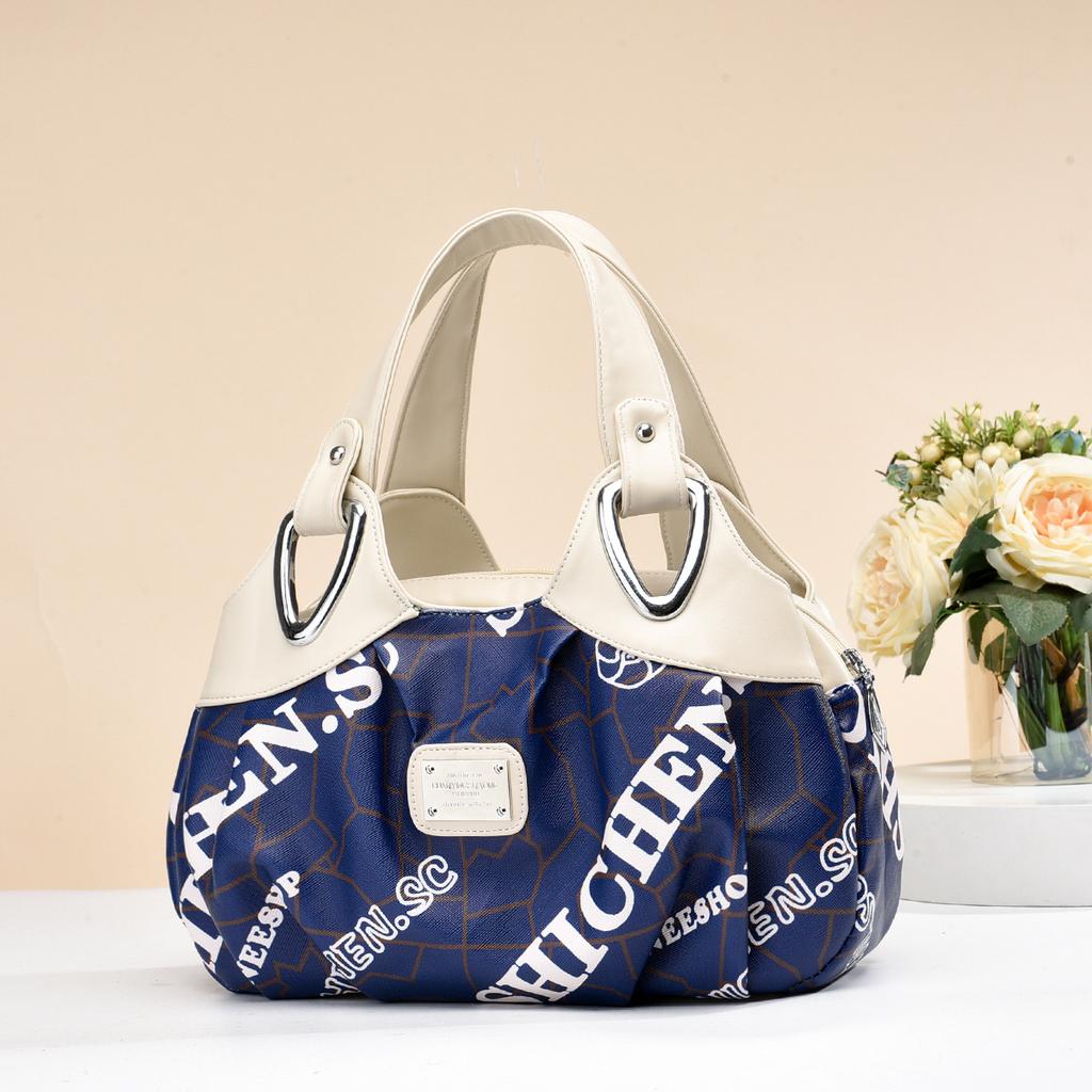 [Recommended] Women's bag summer new simple soft leather handbag large capacity middle-aged mother bag tide