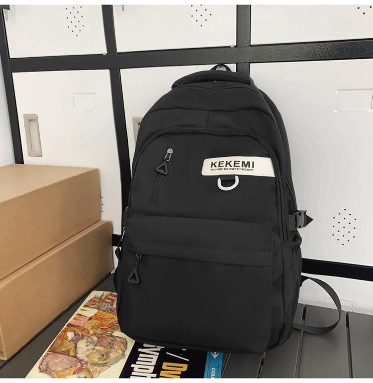 Schoolbag backpack men's 1011 new versatile large-capacity college backpack girls simple junior high school high school bag