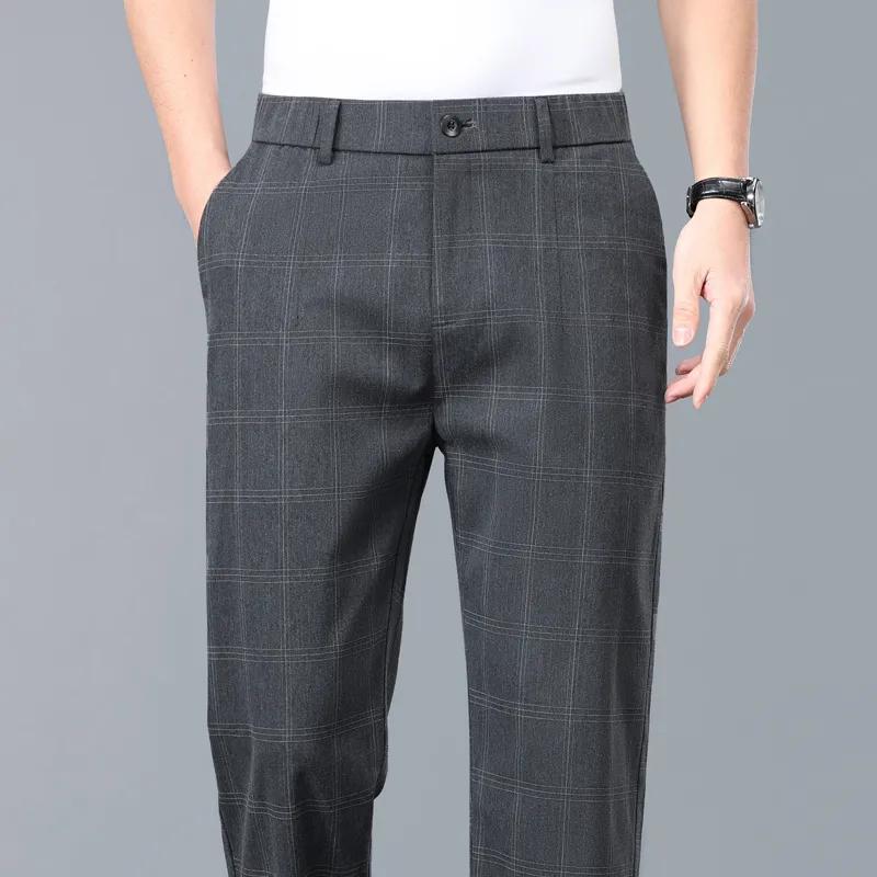 

Летние мужские классические клетчатые рабочие эластичные тонкие брюки мужские деловые серые черные повседневные формальные брюки мужские 33 чёрный