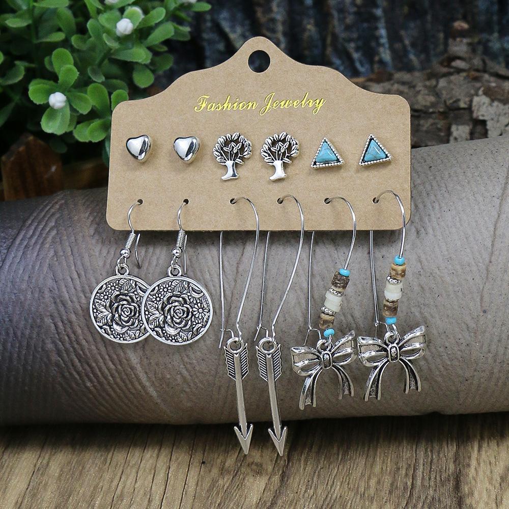 

Серьги цвета старинного серебра с бирюзовой инкрустацией, этнический стиль, геометрические, круглые, банты, подсолнухи, морская звезда, подарки, вечеринка