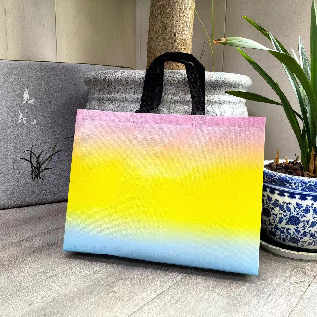 

Барвиста ламінована водонепроникна сумка-тоут для модного одягу та взуття з друком логотипу - неткане подарункове пакування