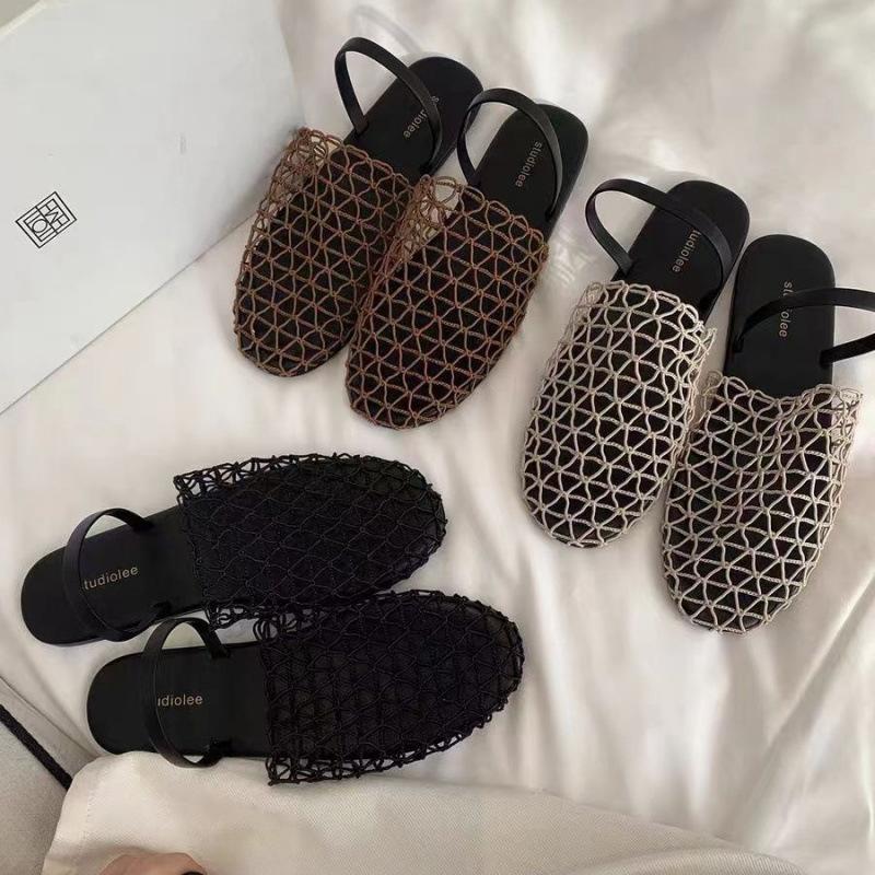 Woven summer new sandals women s flat-bottomed bag head half slippers hollowed out niche fisherman round head fishing net 35 чёрный 5115₽