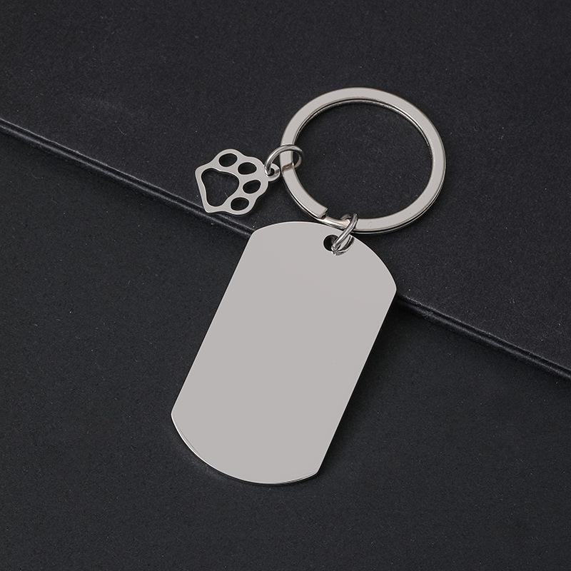 Breloczek do kluczy z łapą psa drukowaną laserowo - Międzynarodowy metalowy prezent