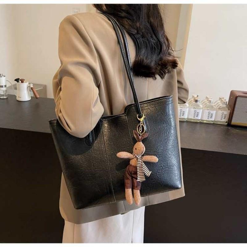 Hochwertige Retro-Tasche mit großem Fassungsvermögen, modische Damen-Umhängetasche für Pendler, beliebte Tragetasche