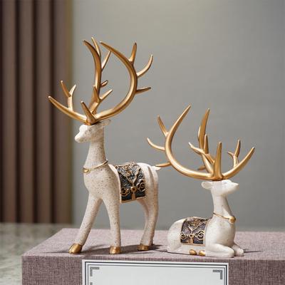 2 Stück Rentierfiguren sitzende stehende Hirschstatuen Retro künstliche Tierhandwerksstatue