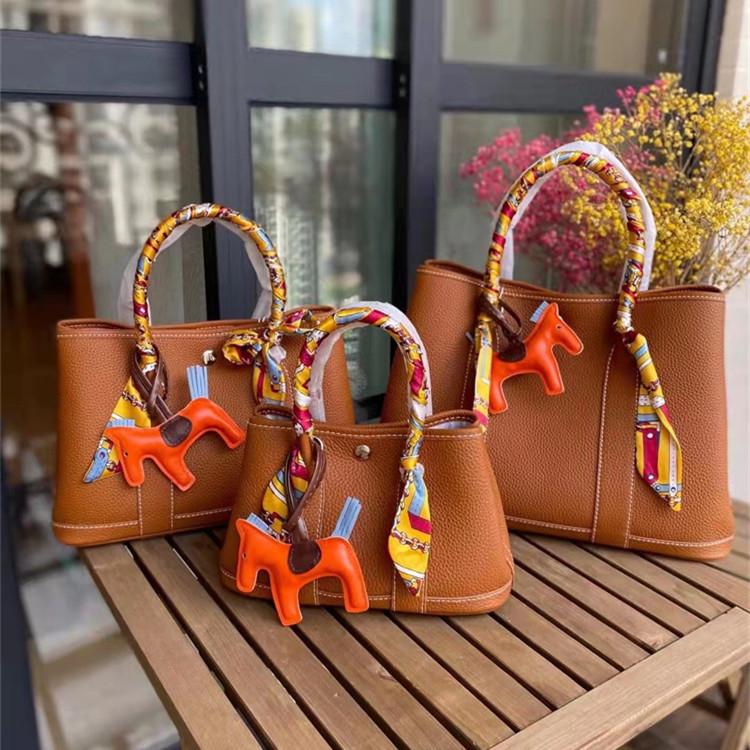 New Bag European and American Popular Women's Bag Garden Bag Canvas Shoulder Strap Portable Shoulder Messenger Bag Cowhide Bag