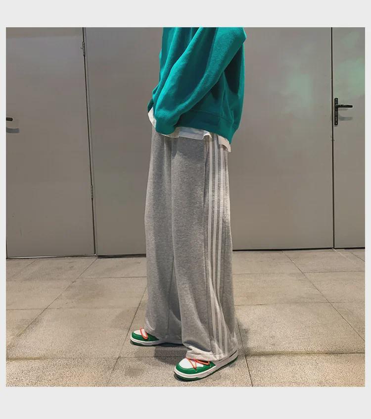 Damskie spodnie sportowe w paski w stylu koreańskim - luźne, sięgające do ziemi, w jednolitym kolorze, na wiosnę i jesień