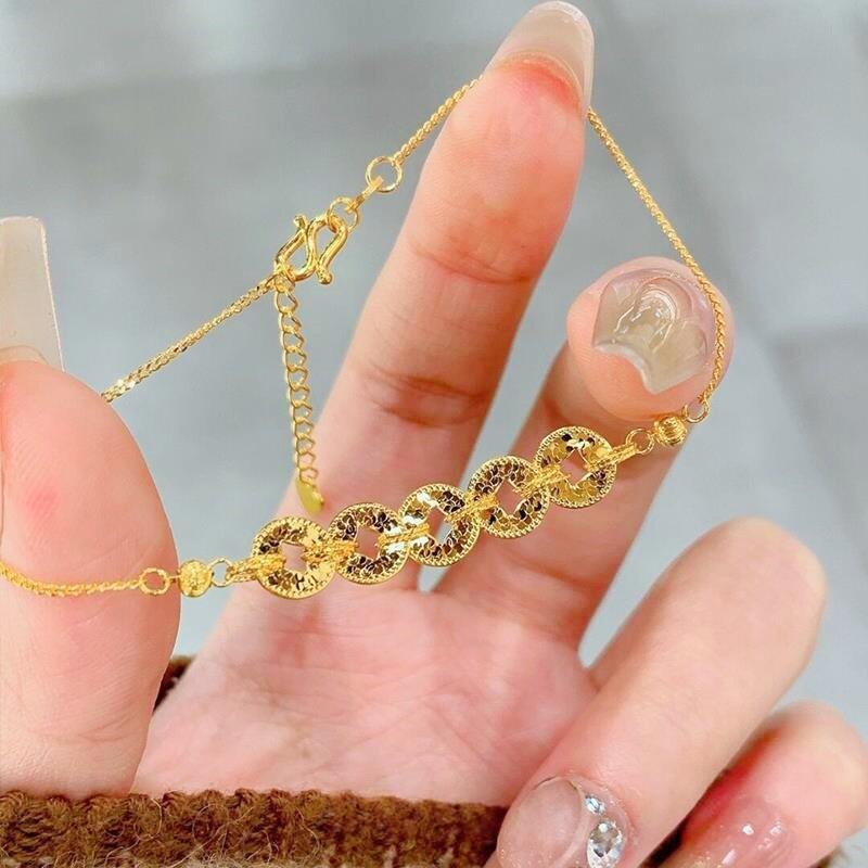 

Gold-Plated Crushed Ice Five Emperor Coins Bracelet: Women s Light Luxury, Niche High-End Style for Wealth and Good Fortune.