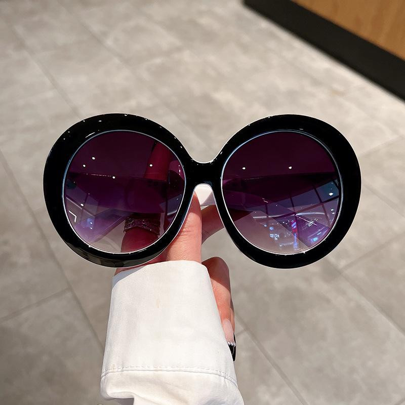 Fashion round large-frame sunglasses, street photography personalized sunglasses trend