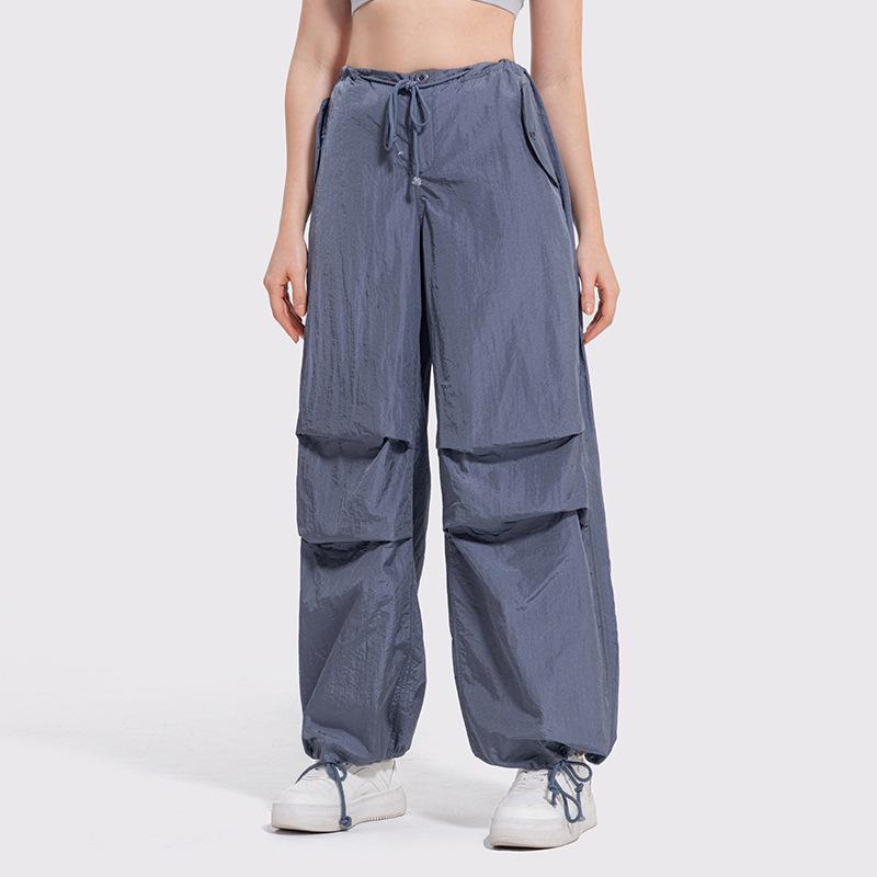 Women's Y2K Wide-Leg Cargo Pants with Drawstring - Slimming American Parachute Design for Casual Sport.