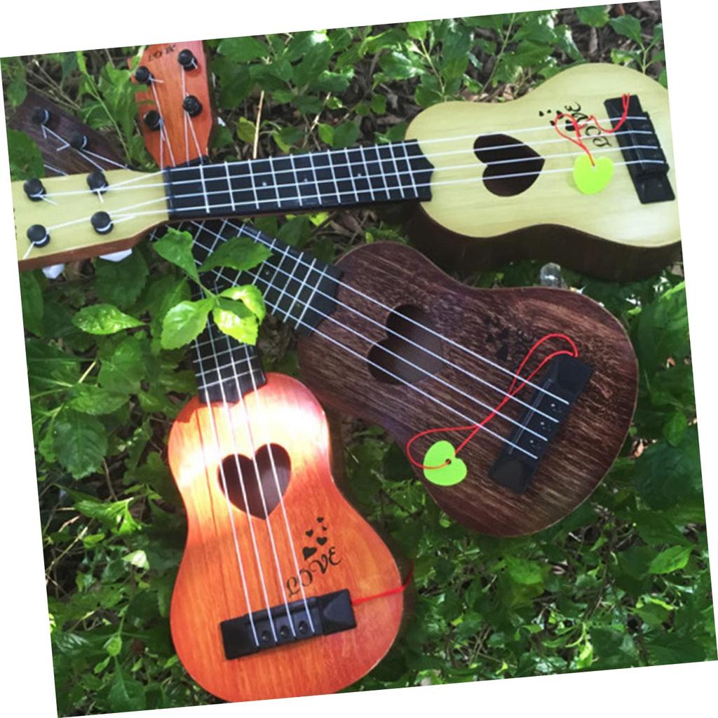 SEWACC Ukulele Plastic Mini Ukulele Mini Guitar for Children Acoustic Guitar 4 String Guitar Beginner Guitar Children Musical Instrument Playable Easy
