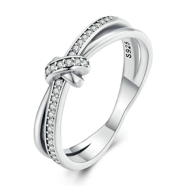 Elegant European & American Style S925 Sterling Silver Knot Ring with Micro-paved Zircon - Simple, High-end Fashion for Women.