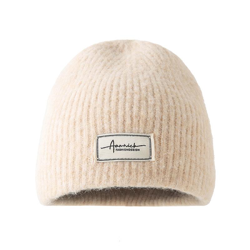 Simple cloth label wool wool hat women's autumn and winter comfortable cold hat outdoor cycling ear hat fashionable versatile knitted hat