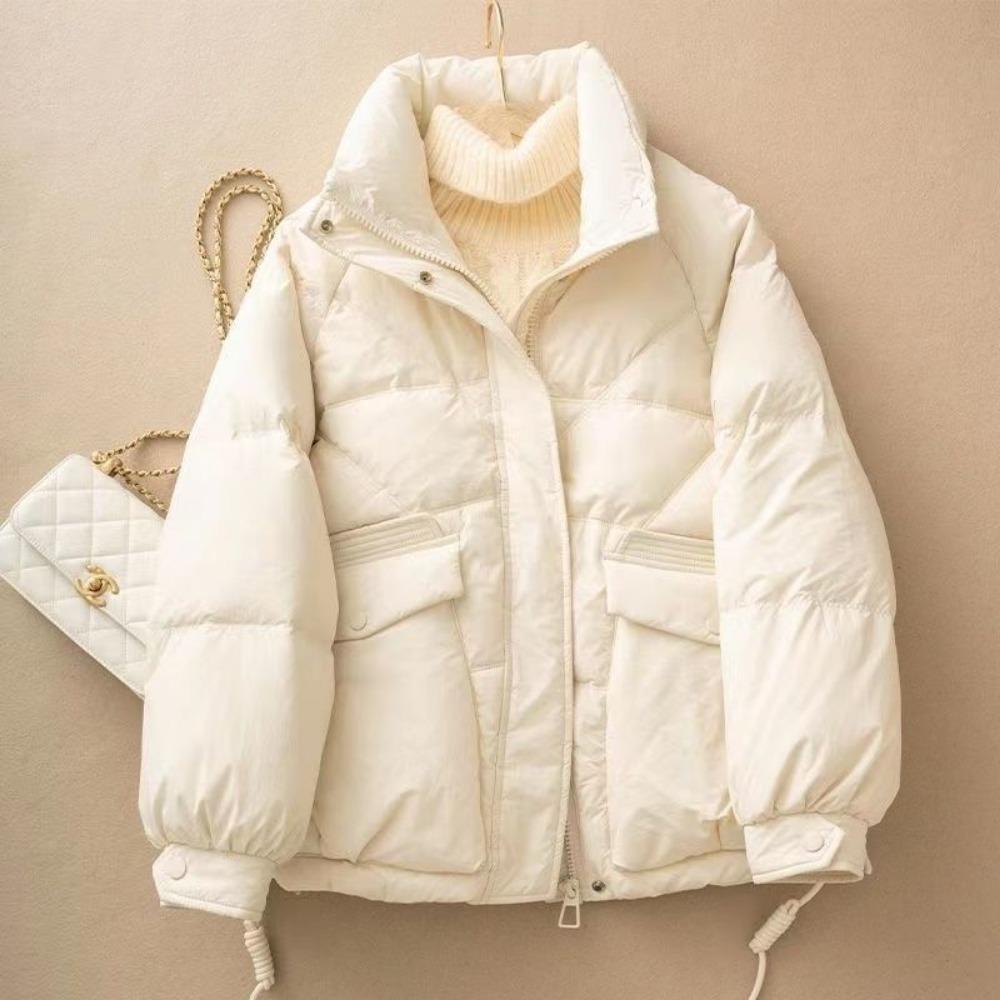 The new versatile down cotton-padded jacket with a loose stand-up collar and thickened coat in the Korean style is trendy