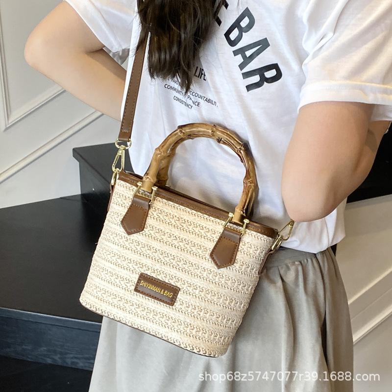 Summer hand bag small bucket bag women's 2025 new simple high-end shoulder bag niche messenger straw bag