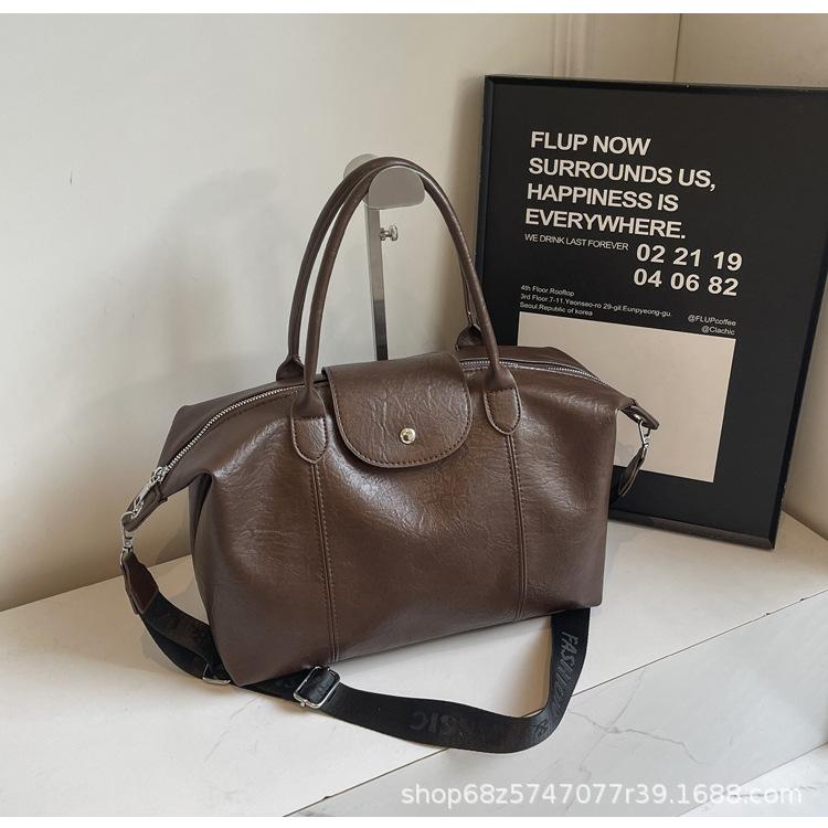 

Soft leather portable tote bag 2025 new retro commuter bag women s large-capacity messenger pu shoulder messenger bag