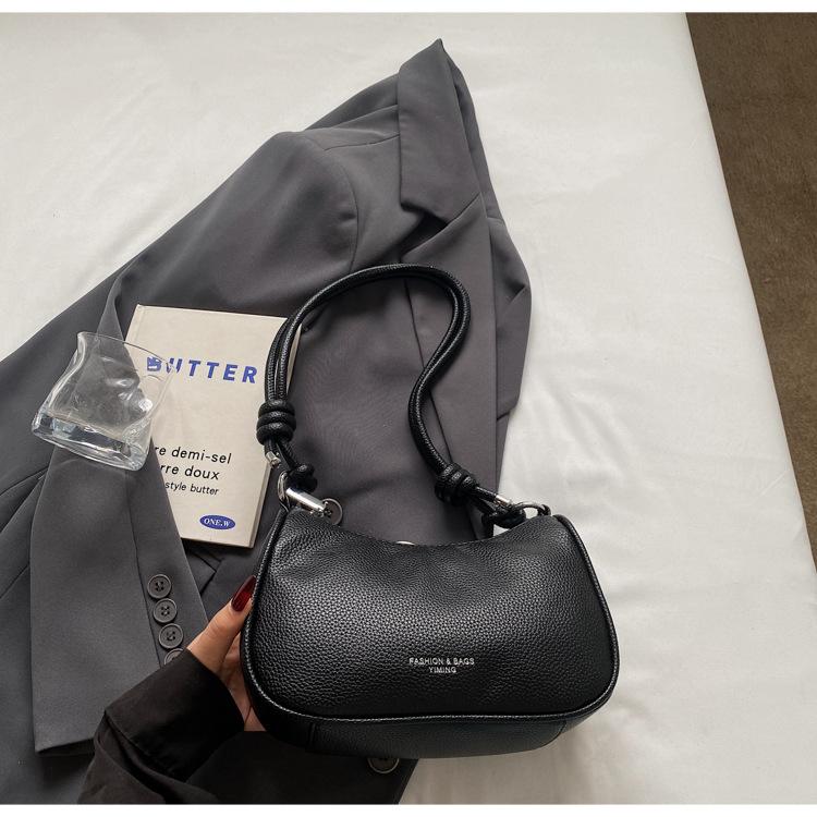 Fashion pleated portable women's bag 2025 summer new fashion shoulder bag simple foreign niche design messenger bag