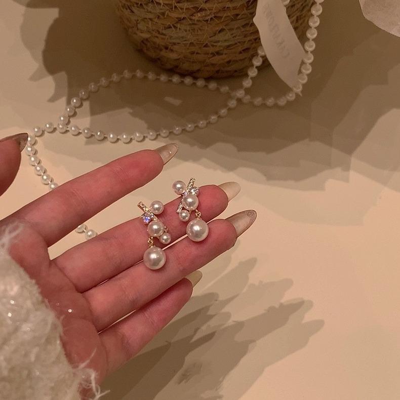 925 Silver Needle Pearl Earrings Women's High-end Sense Niche Temperament Bow Stud Earrings Retro Ear Jewelry Wholesale