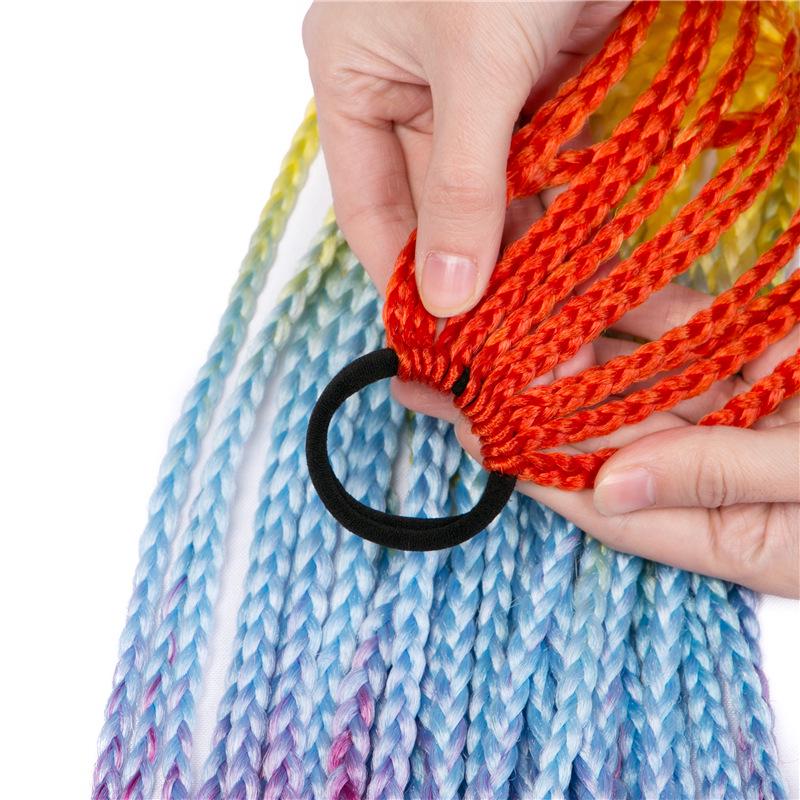Coda di cavallo intrecciata con dreadlock in stile etnico per bambini