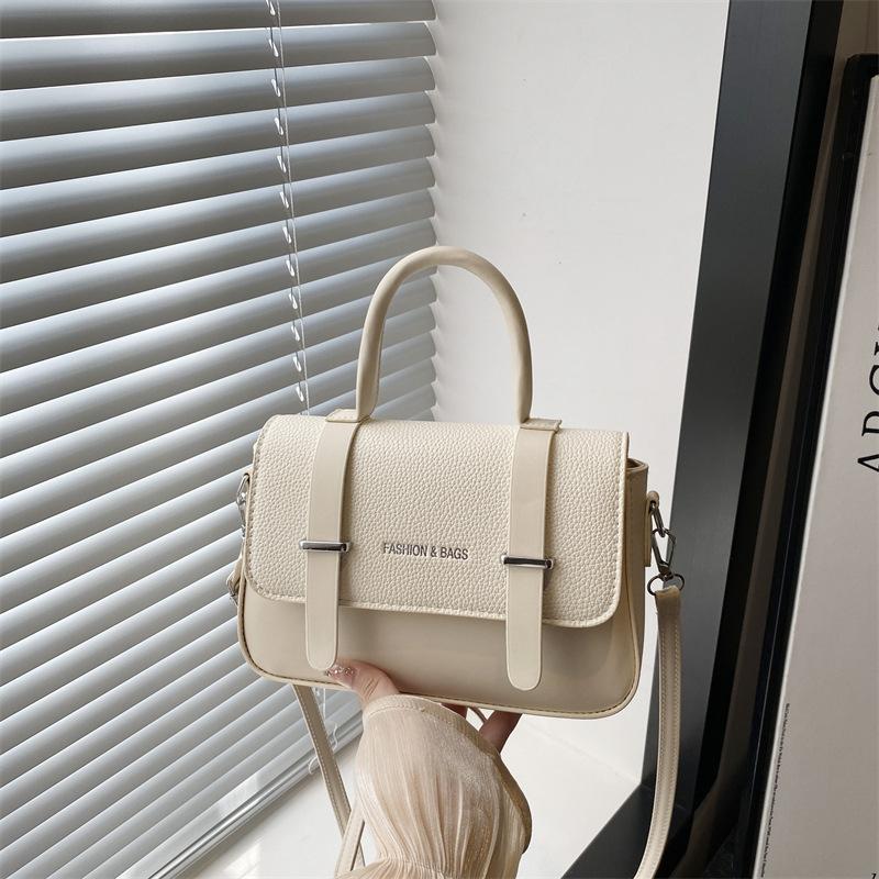 

New high-end messenger bag niche design women s shoulder messenger handbag Cambridge bag versatile small square bag білий