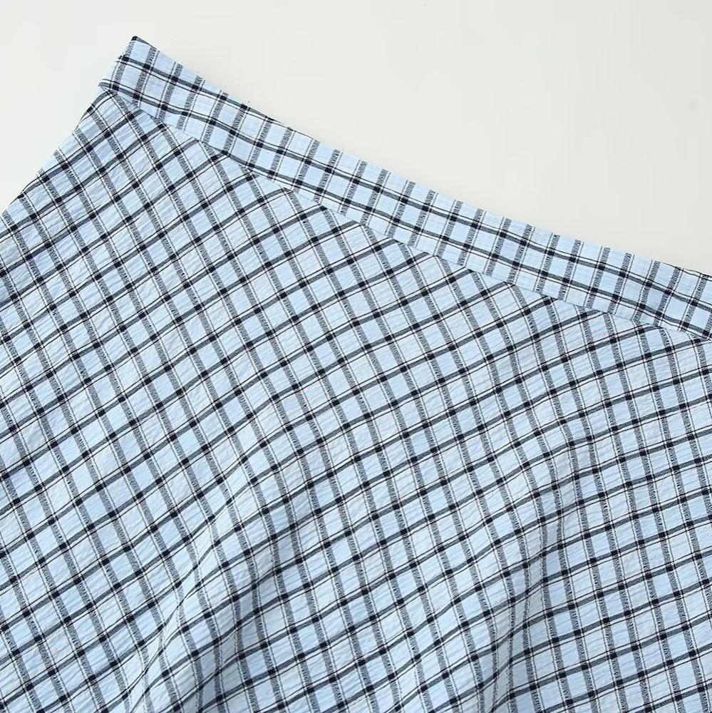 Europäischer und amerikanischer Stil, neue Damenbekleidung, ausländischer Stil, vielseitig, modischer karierter asymmetrischer Midi-Rock