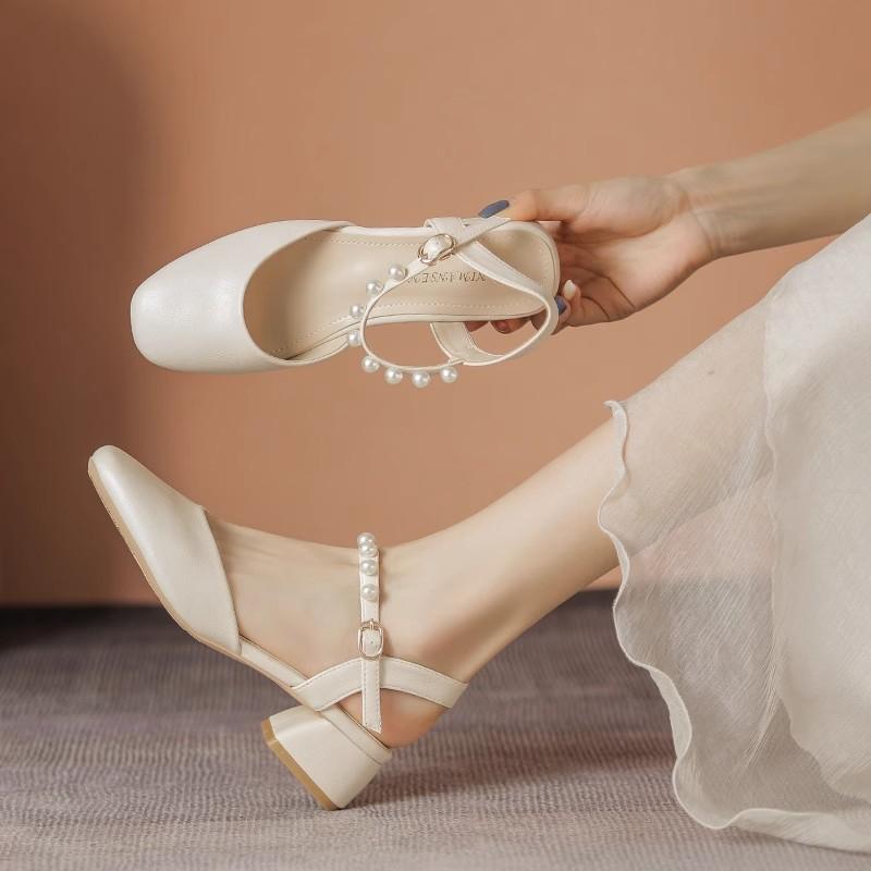 Baotou sandals summer new thick heel middle heel pearl one-word buckle with skirt back empty sandals single shoes women