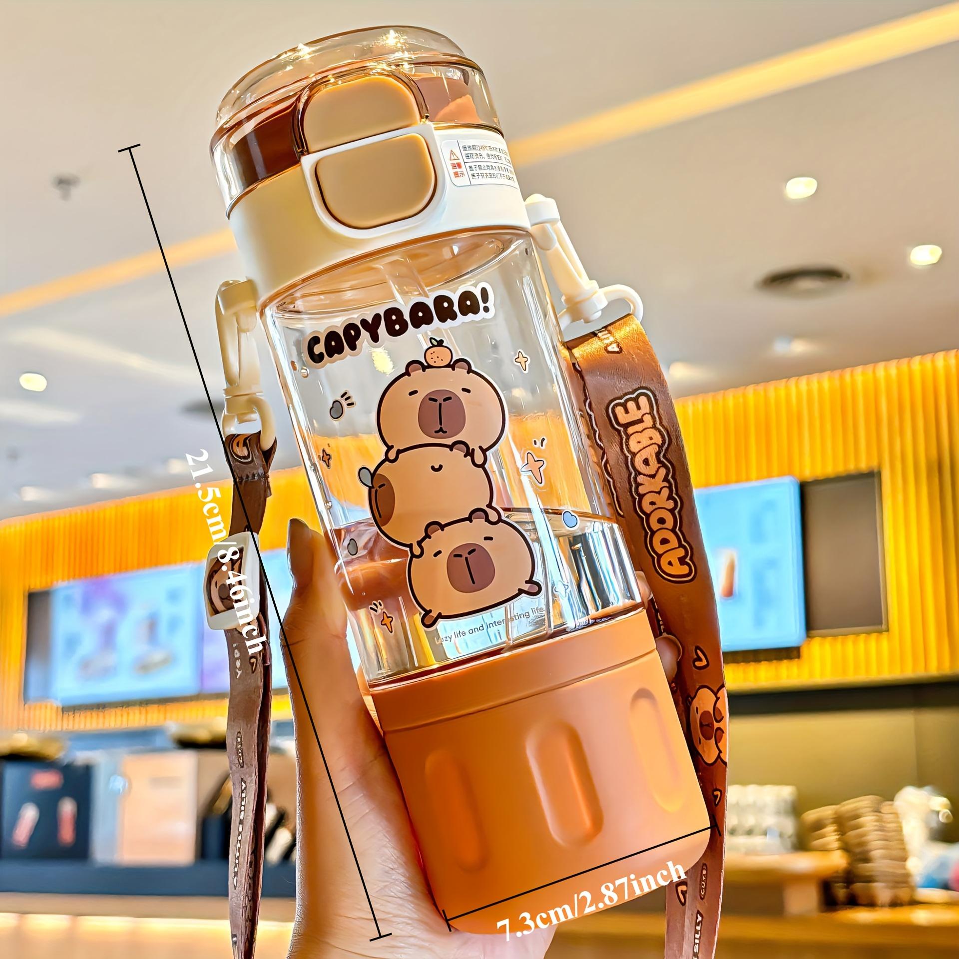 

580ml Cute Dolphin Cartoon Plastic Water Bottle with Straw and Adjustable Shoulder Strap, Suitable for Summer and Travel