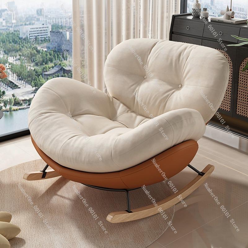 Modern minimalist rocking lounge chair for balcony or living room relaxation,soft lazy sofa cushion design allowing both sitting