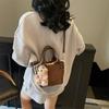 High-end Niche Woven Bag Women's New Versatile Messenger Bag Simple Portable Bucket Bag