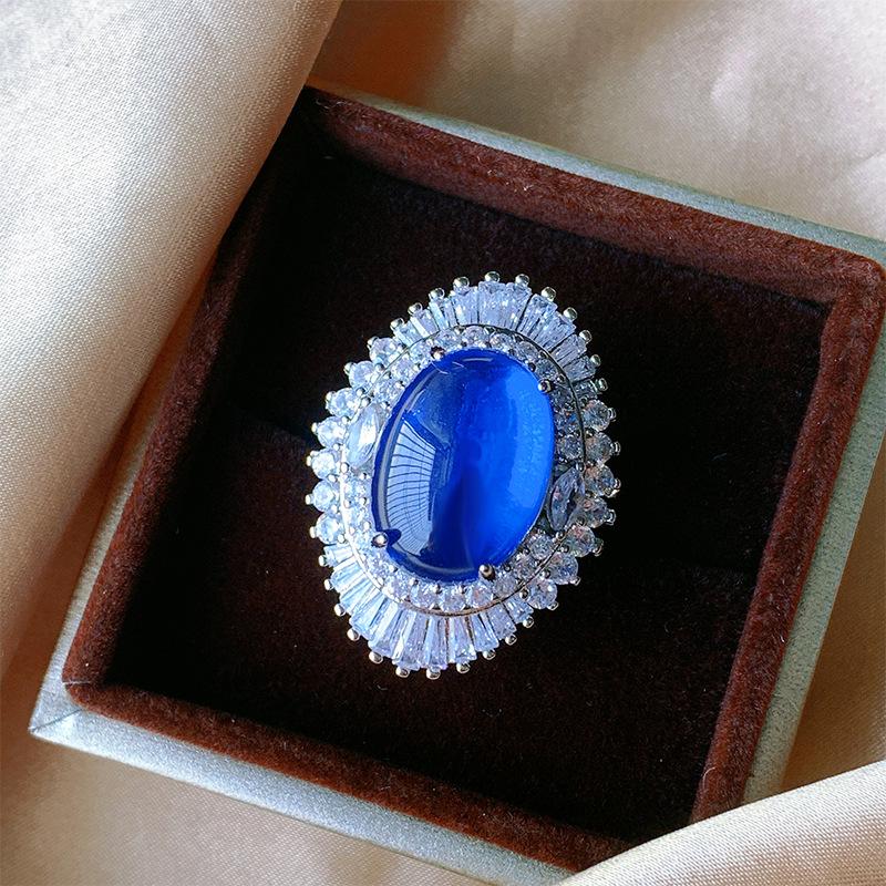 

Jewelry Copper Bottom Gold-Plated Blue Spinel Ice Seed Fluorescent Denier-Shaped Plain Surface Temperament Set Female Host 13 * 18