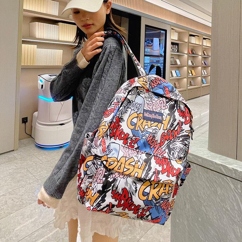 

Backpack 2025 New Japanese Fashion Graffiti Backpack School Season School Spirit High School Student Large Capacity Student School Bag чорний