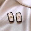 Elegant Gold-Plated Black Zircon Stud Earrings - Niche Design for a Luxurious Fashion Statement