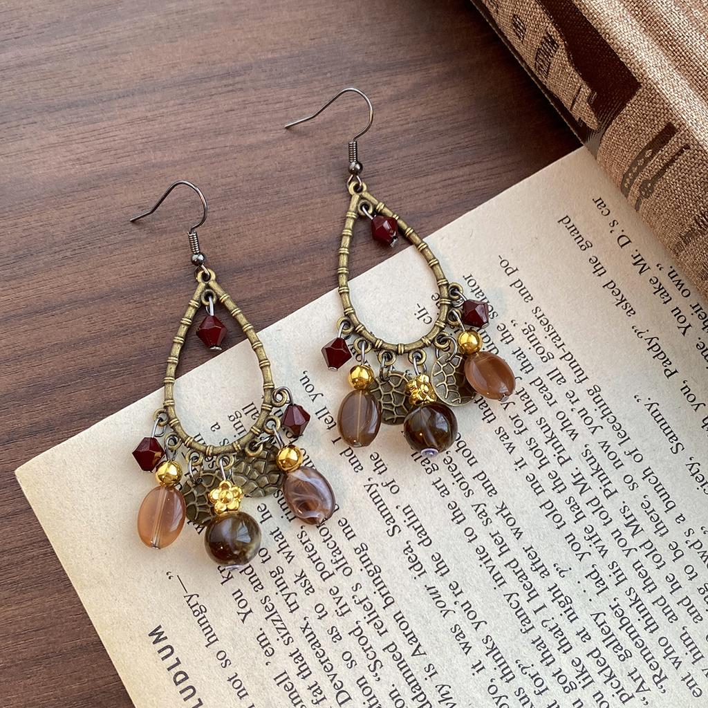 Kolczyki z zawieszką w kształcie muszli w stylu retro etnicznym, modne, z osobowością, niszowe, temperamentne, kolczyki o wykwintnym designie