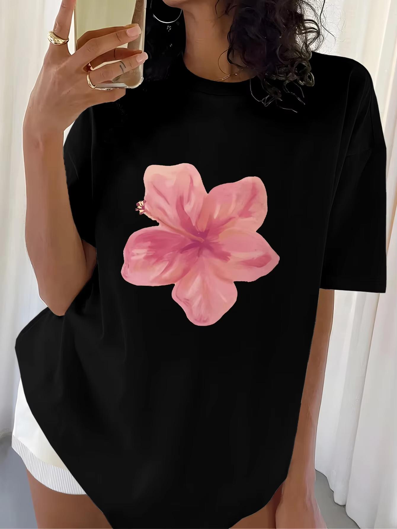 

Women s White Graphic Tee with Pink Hibiscus Print for Tropical Themed Events and Summer Outings Women Clothing 4XL