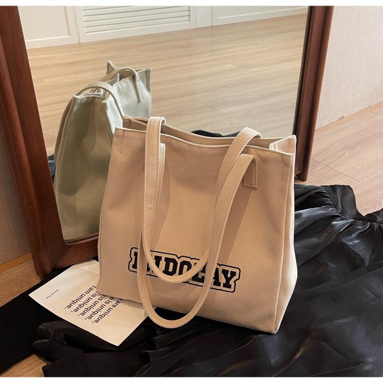

Cloth bag women s 2025 spring new casual fashion shoulder bag popular student class commuting tote bag хаки