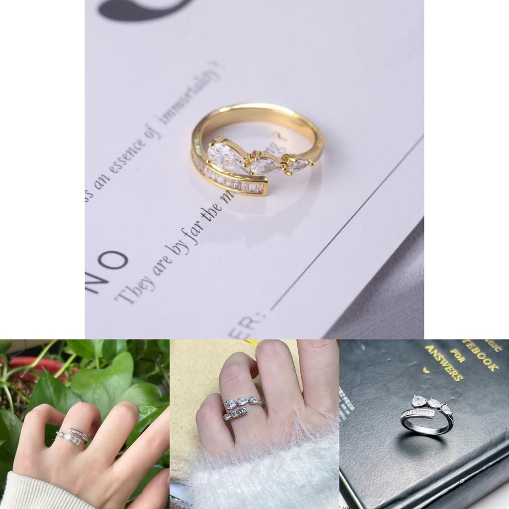 Stylish Women's Open Ring With Dazzling Zircon Stone Accents And Contemporary Water Drop Design