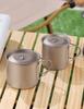 Pure Titanium Travel Mug with Lid and Folding Handle - Perfect for Coffee, Tea, or Water on Camping Trips