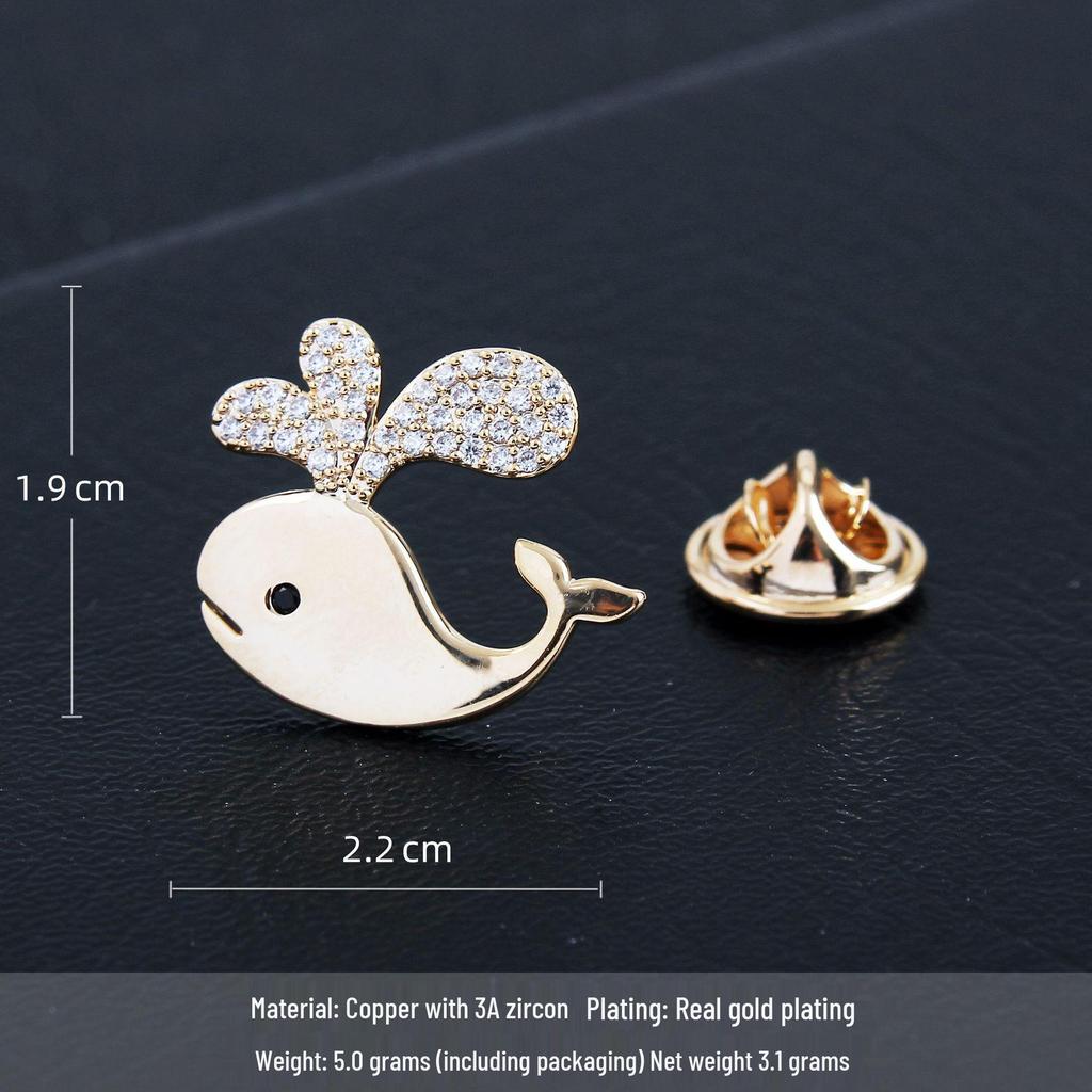 Elegant Gold-Plated Whale Brooch for Women with Zircon Inlay – High-Grade, Niche Lapel Pin with Anti-Exposure Button.
