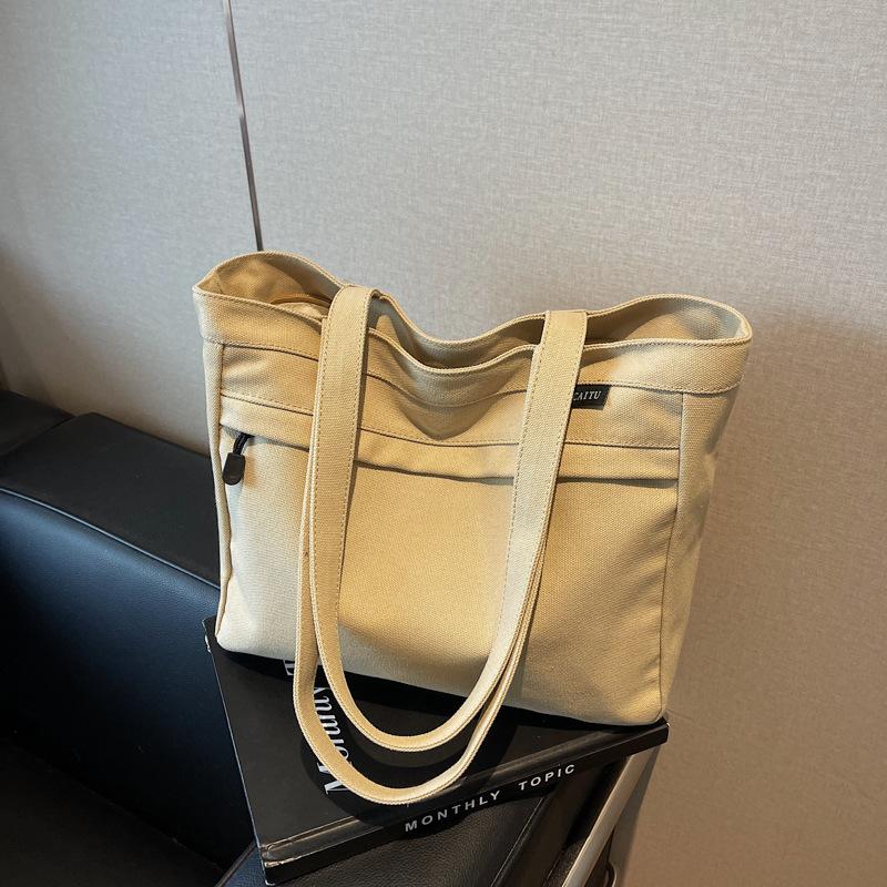 Casual large-capacity canvas bag women's new fashion versatile shoulder bag college student class bag
