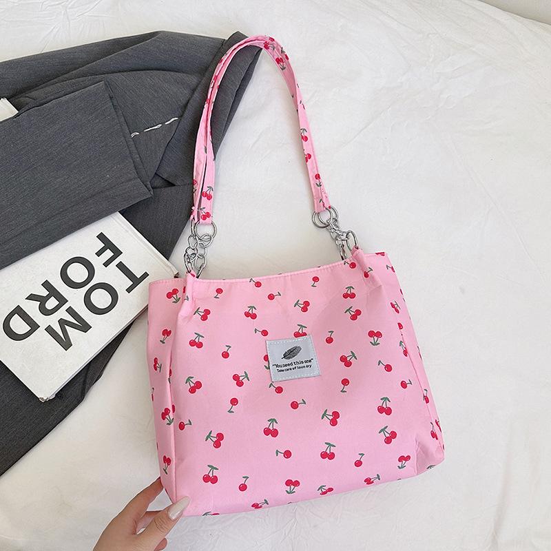 Large capacity niche design shoulder bag, new tote bag, portable women's bag, student shopping bag.