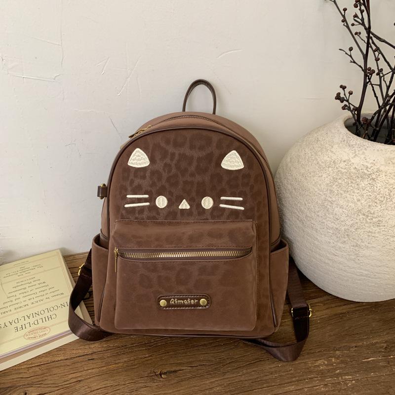 Schoolbag Korean version retro large-capacity backpack niche design cute kitten student schoolbag versatile popular commuter backpack