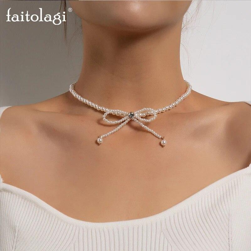 Elegantní perlové náhrdelníky s mašlí se zirkonem pro ženy Náhrdelníky s imitací perly s mašlí Nádherný náhrdelník s mašličkou