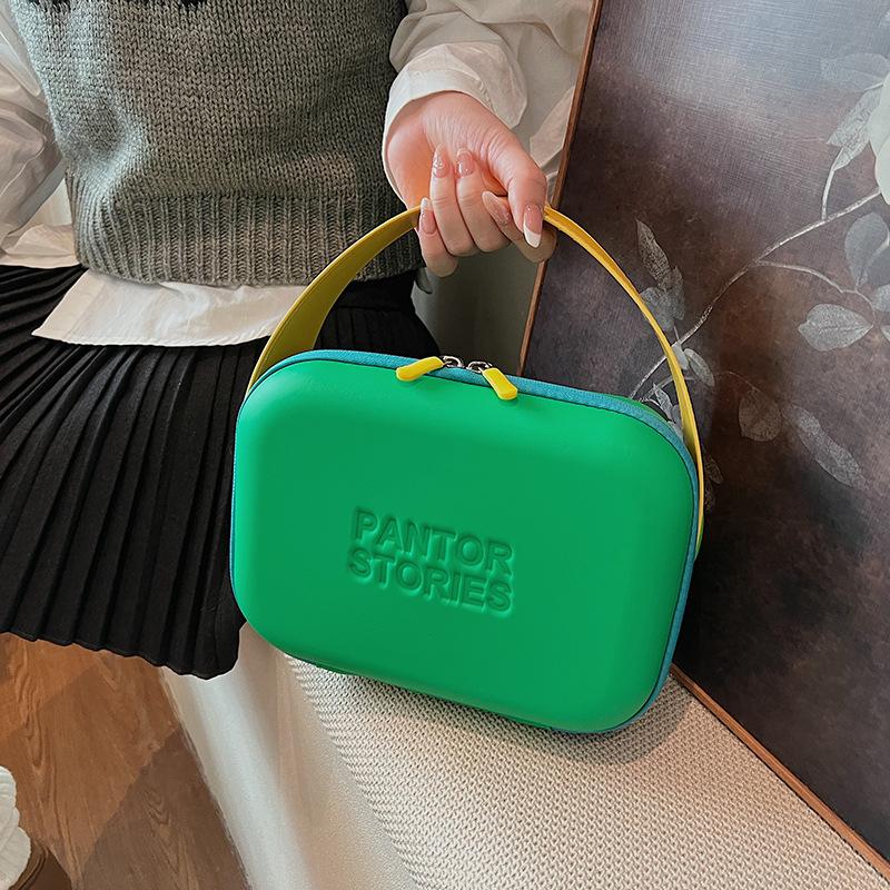 

Женские сумки для внешней торговли, новые модные женские портативные косметички, силиконовые брызгозащитные косметички, дорожные сумки конфетных цветов. 24*9*18 зелёный