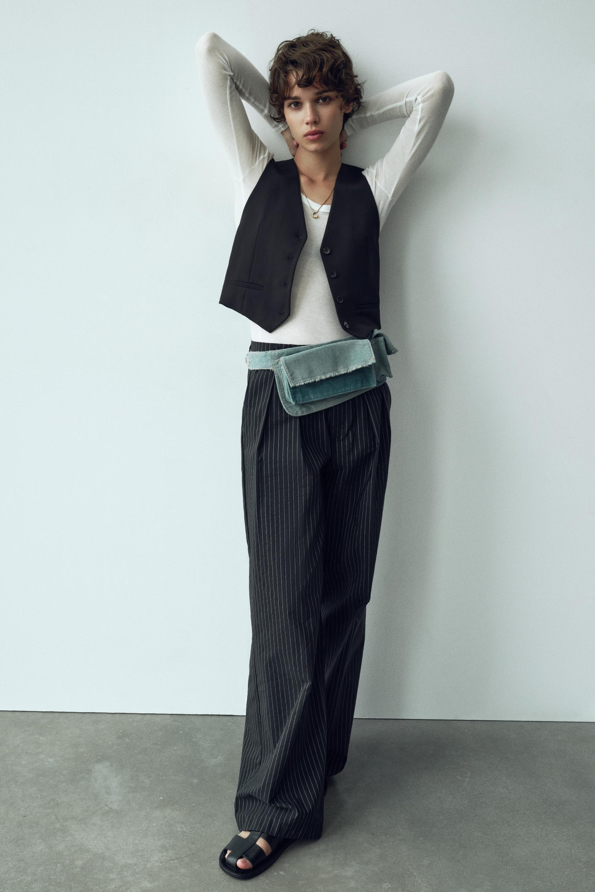 

Укороченный жилет приталенного кроя