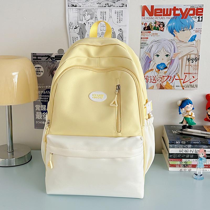 

Youth Campus Style Nylon Student Backpack With Arcshaped Shoulder Straps And Versatile Design жовтий
