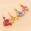 Artistic Tulips Themed Key Accessory Crafted From Leather With Elegant Bead Embellishment