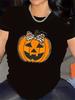 A Short-Sleeved T-Shirt Decorated with a Pumpkin Pattern, Perfect for Halloween Celebrations. It Is